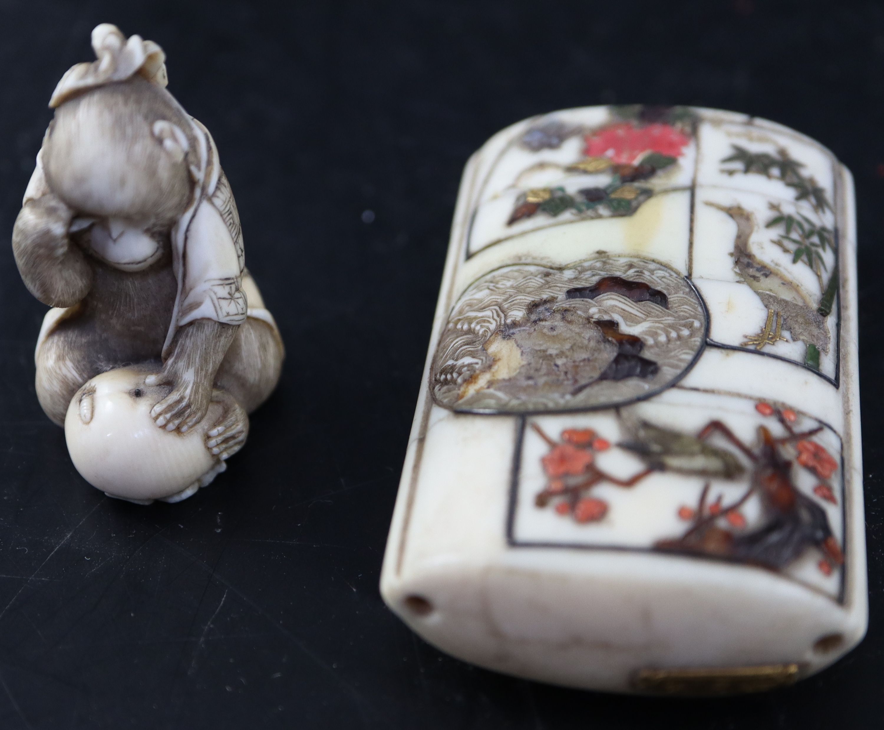 A Japanese Meiji period ivory and shibayama three division inro & an okimono